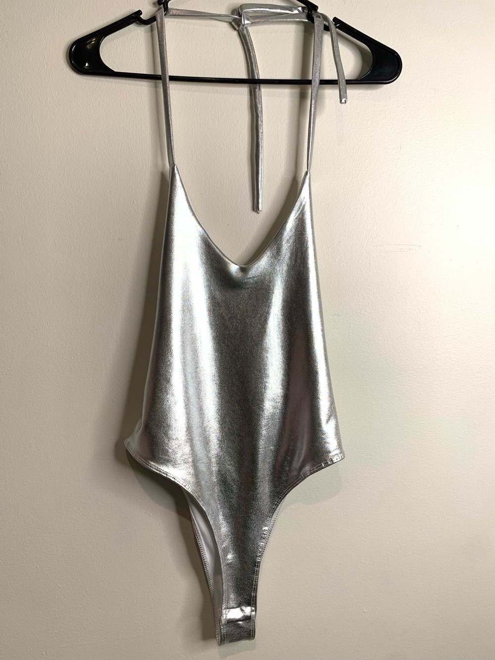 Small New Silver Metallic One-piece Bodysuit Features a Deep V-neckline